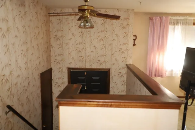 a bathroom with a toilet and a sink