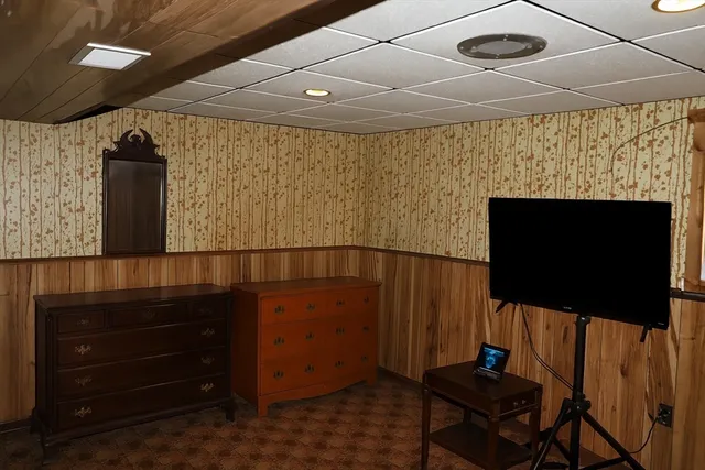 a bathroom with a tub and sink