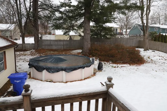 a view of a backyard of the house