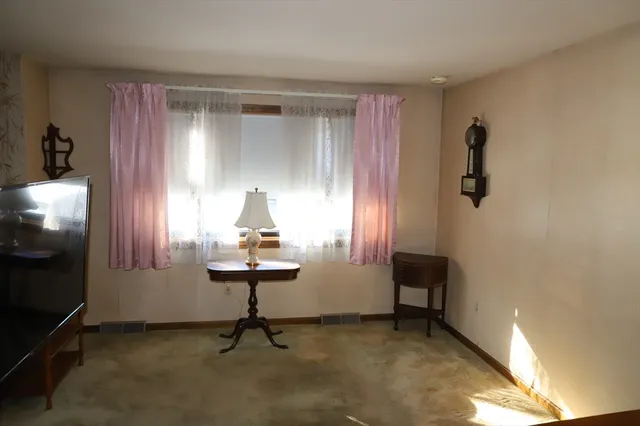 a view of a livingroom with furniture