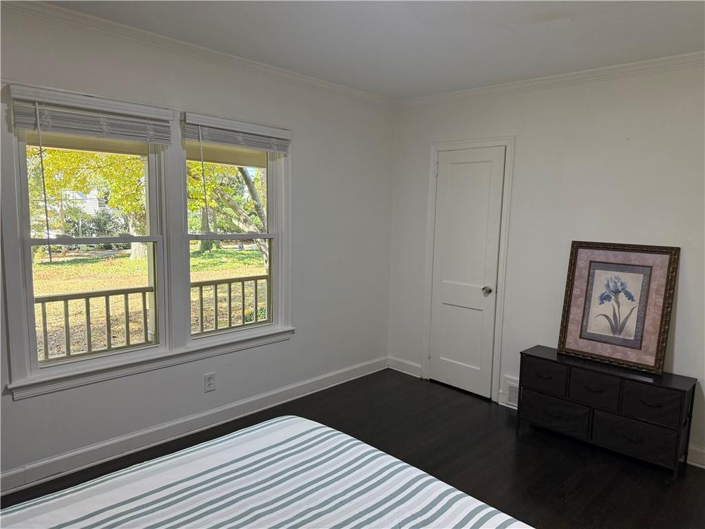 1140 Goodwin Place Northeast, Unit 4 Atlanta, GA 30319 - Photo 24 of 50 a view of a livingroom with wooden floor and a window