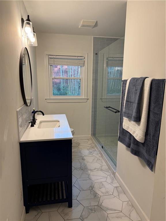 1140 Goodwin Place Northeast, Unit 4 Atlanta, GA 30319 - Photo 28 of 50 a bathroom with a sink and a mirror
