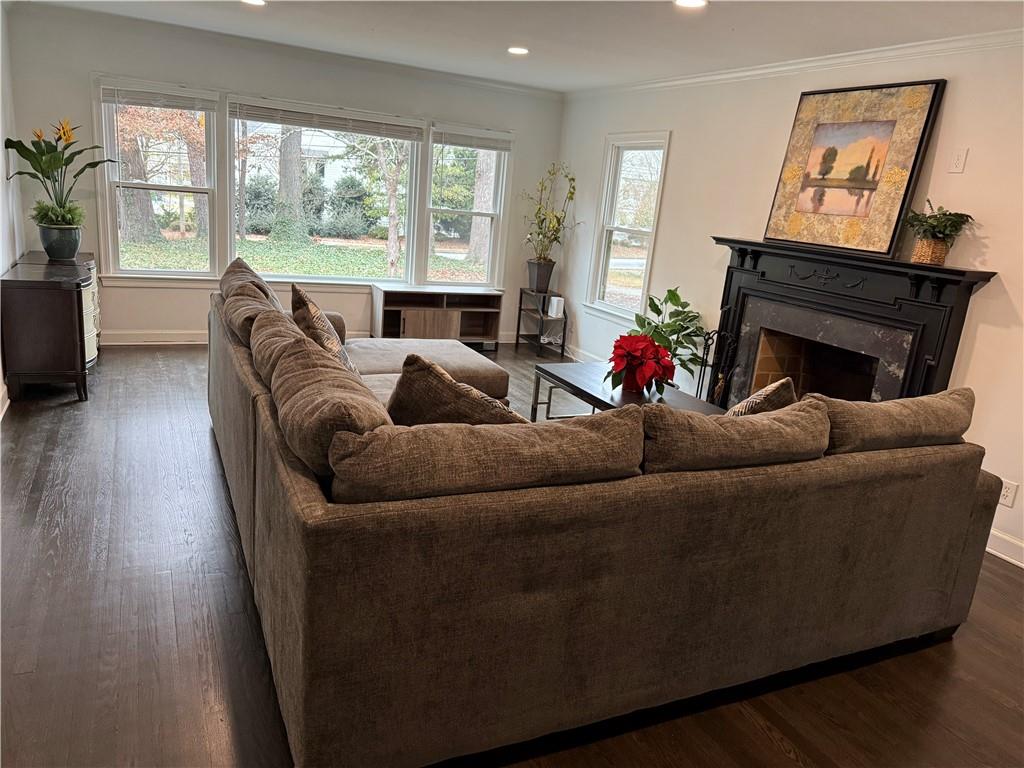 1140 Goodwin Place Northeast, Unit 4 Atlanta, GA 30319 - Photo 45 of 50 a living room with furniture and a fireplace