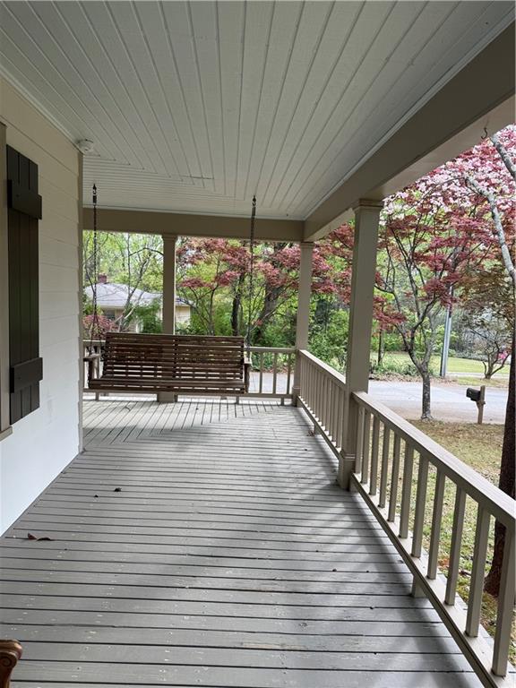 1140 Goodwin Place Northeast, Unit 4 Atlanta, GA 30319 - Photo 49 of 50 a view of porch with wooden floor