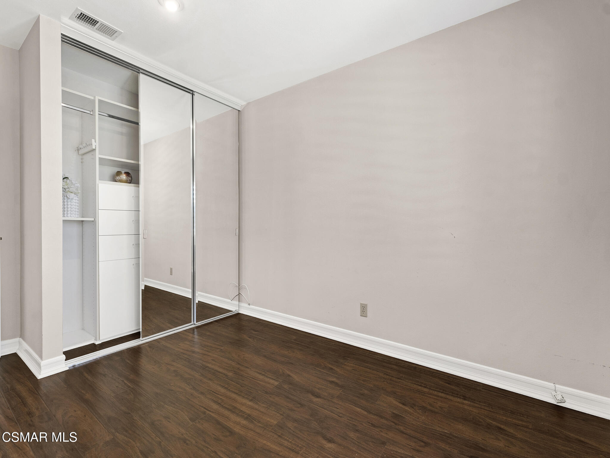 1506 Rambling Road Simi Valley, CA 93065 - Photo 22 of 79 an empty room with wooden floor