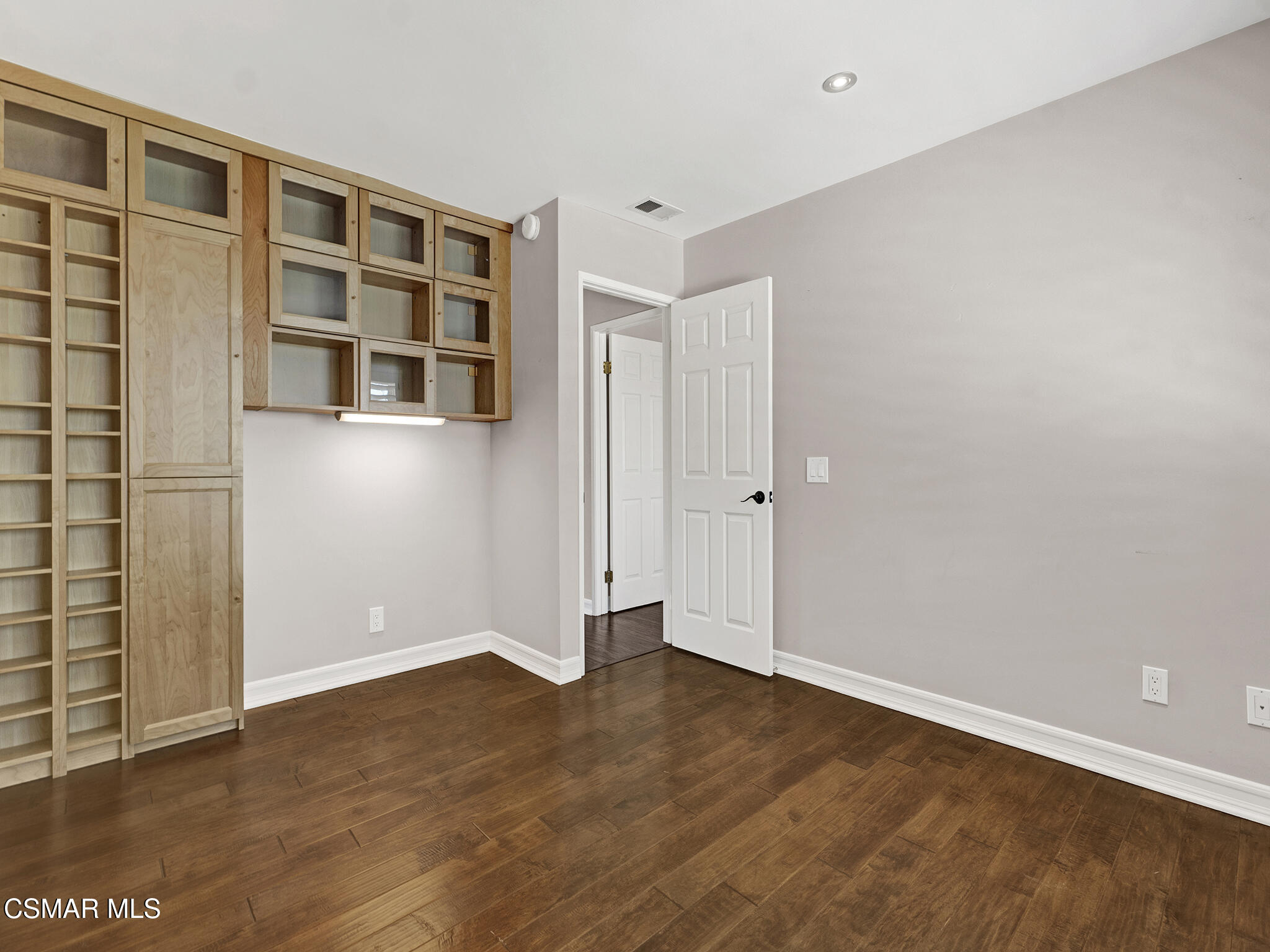 1506 Rambling Road Simi Valley, CA 93065 - Photo 26 of 79 an empty room with wooden floor and closet