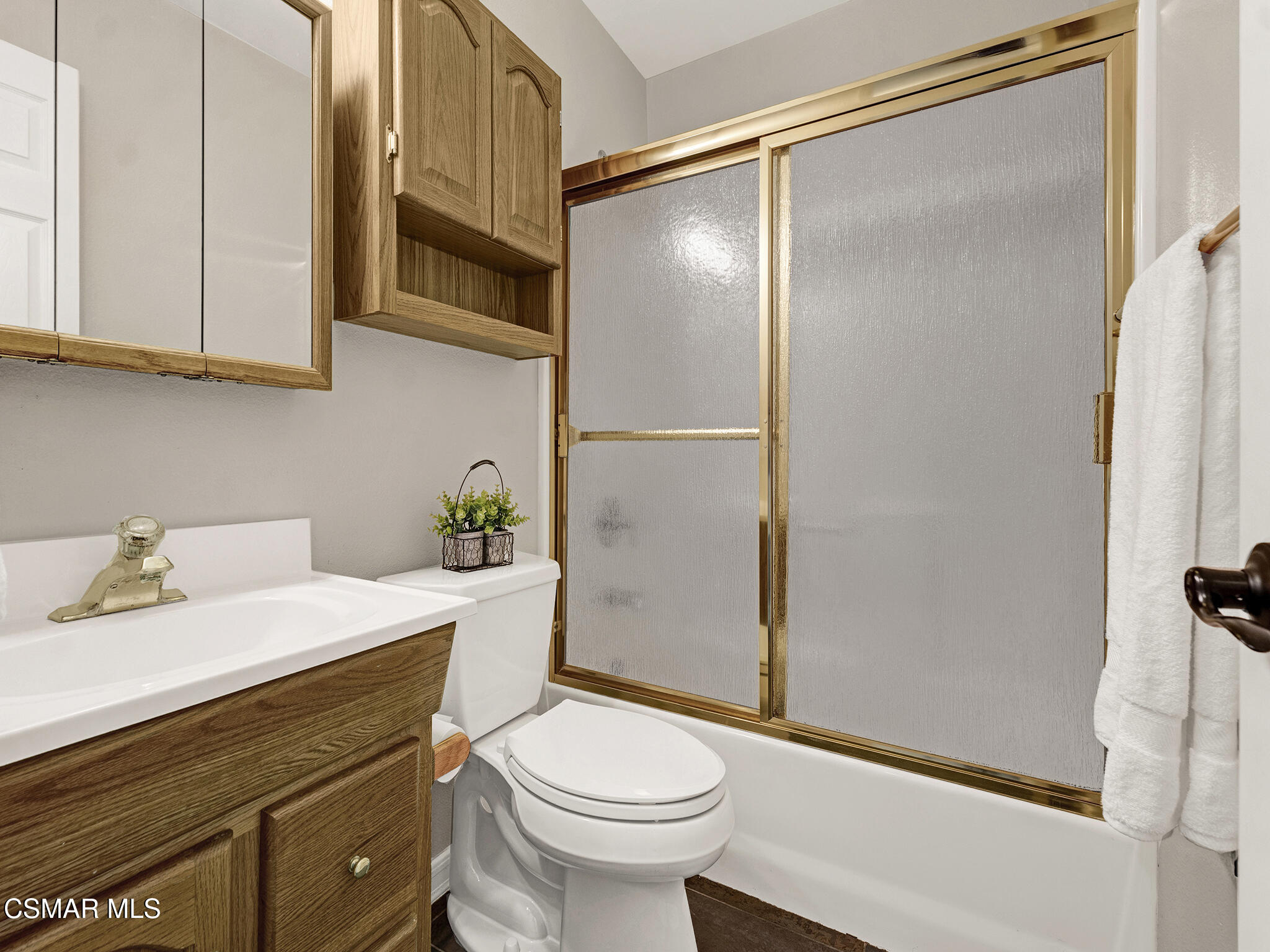 1506 Rambling Road Simi Valley, CA 93065 - Photo 27 of 79 a bathroom with a sink a toilet and shower