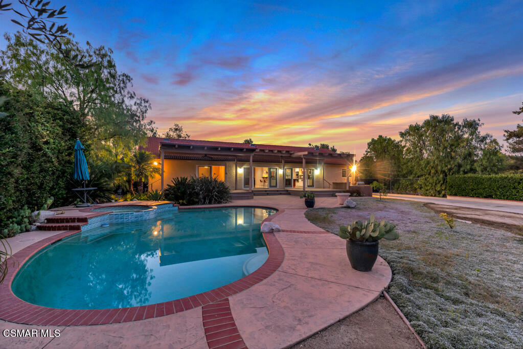 1506 Rambling Road Simi Valley, CA 93065 - Photo 30 of 79 a view of a swimming pool with a patio