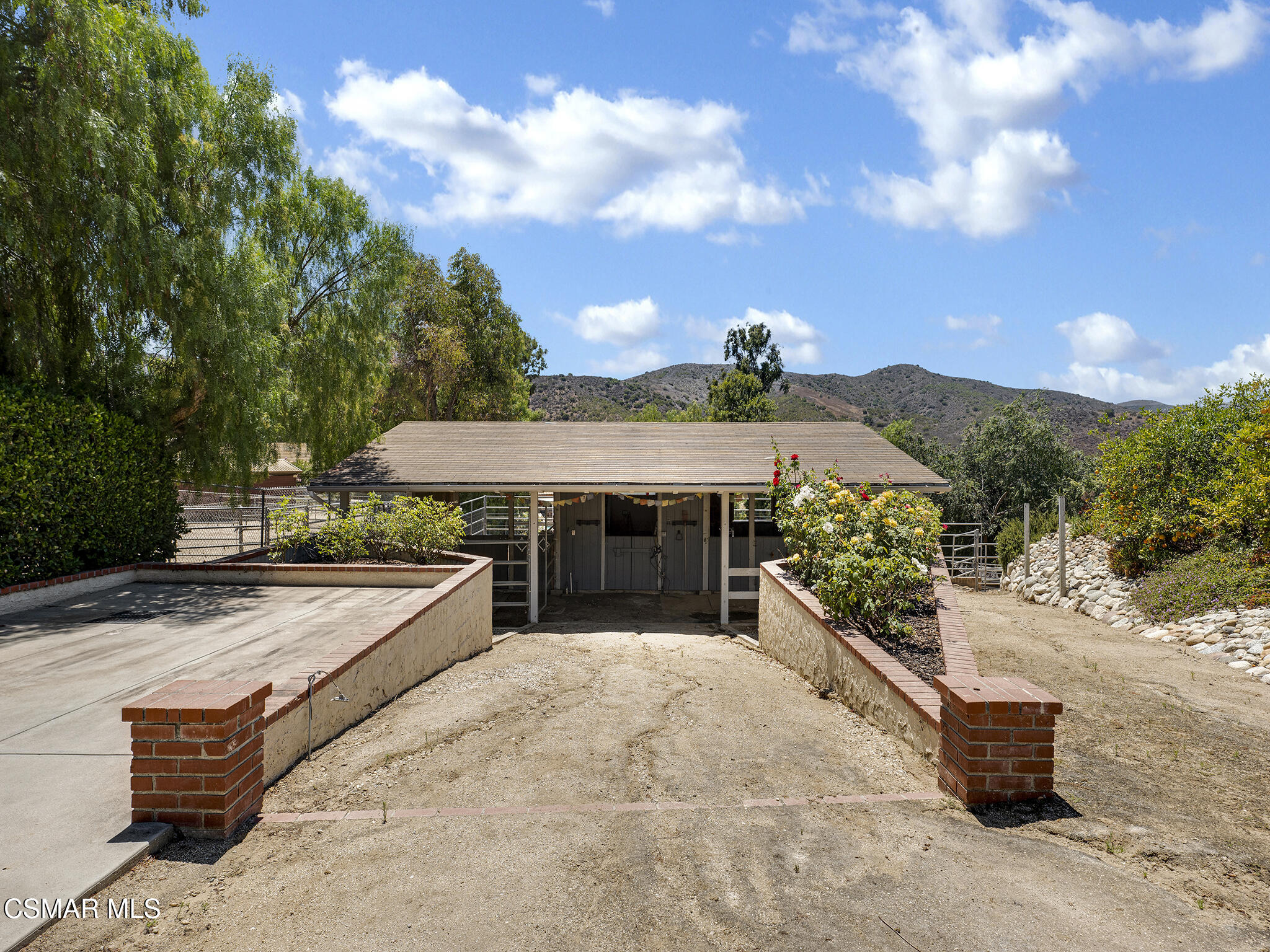 1506 Rambling Road Simi Valley, CA 93065 - Photo 36 of 79 a view of a house with backyard and sitting area
