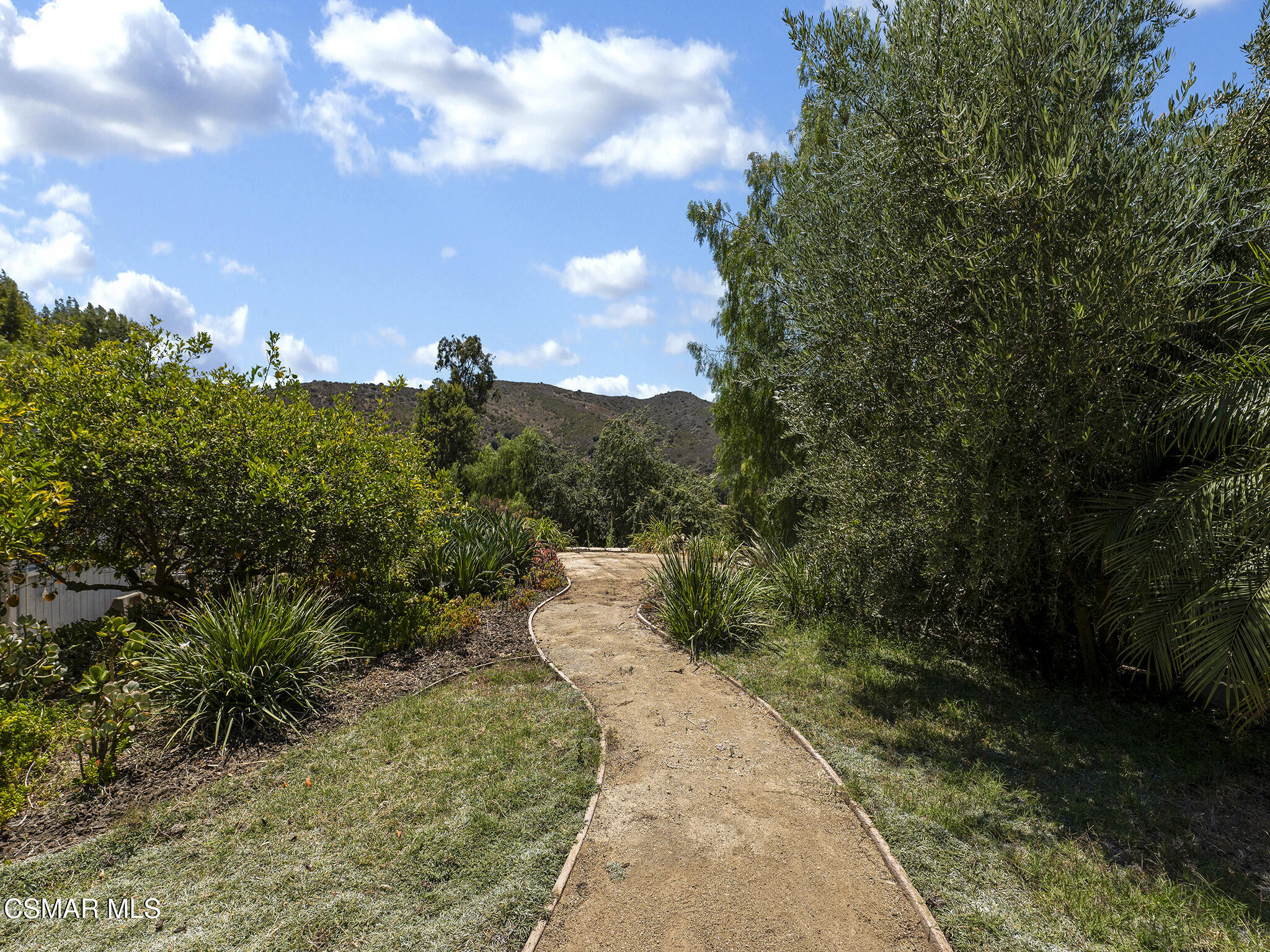 1506 Rambling Road Simi Valley, CA 93065 - Photo 47 of 79 a view of a pathway both side of yard