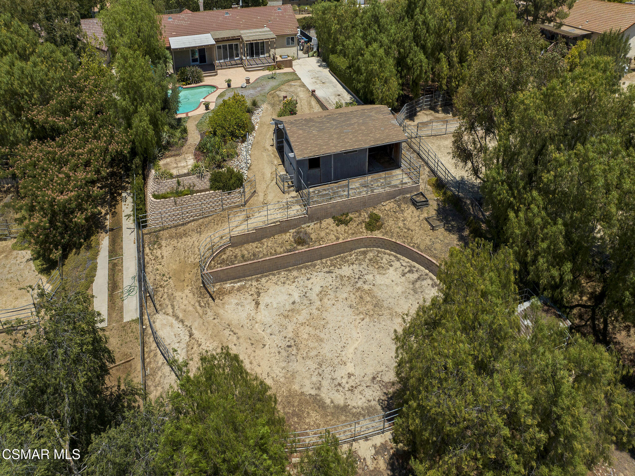 1506 Rambling Road Simi Valley, CA 93065 - Photo 55 of 79 a view of a house with a yard and sitting area
