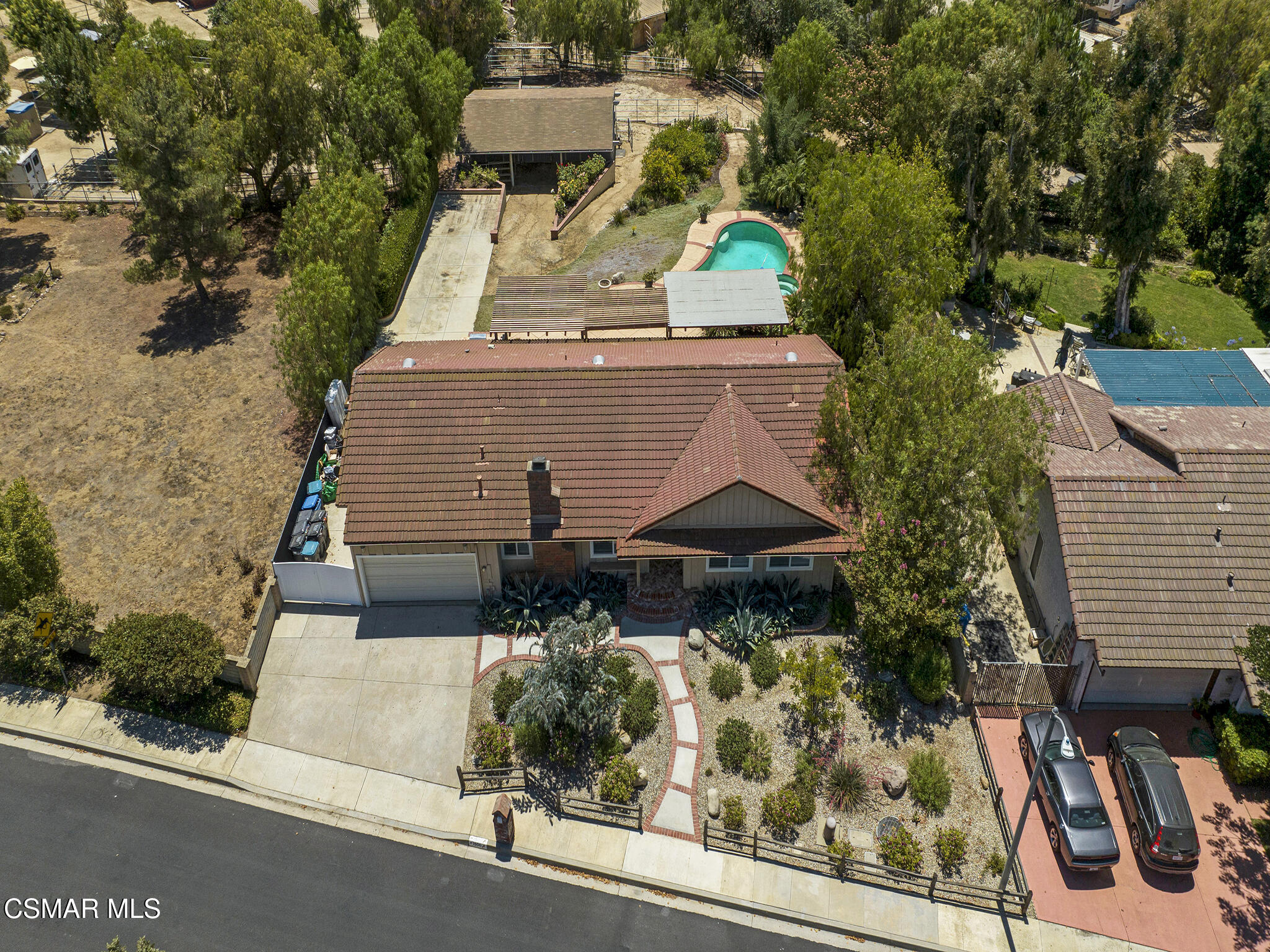 1506 Rambling Road Simi Valley, CA 93065 - Photo 60 of 79 an aerial view of a house with yard and trees