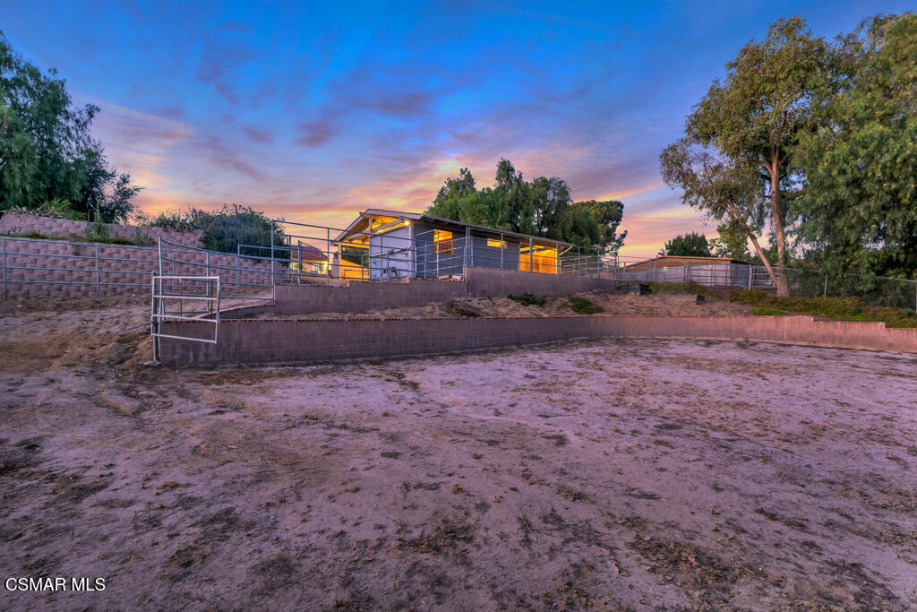 1506 Rambling Road Simi Valley, CA 93065 - Photo 66 of 79 a backyard of a house with table and chairs