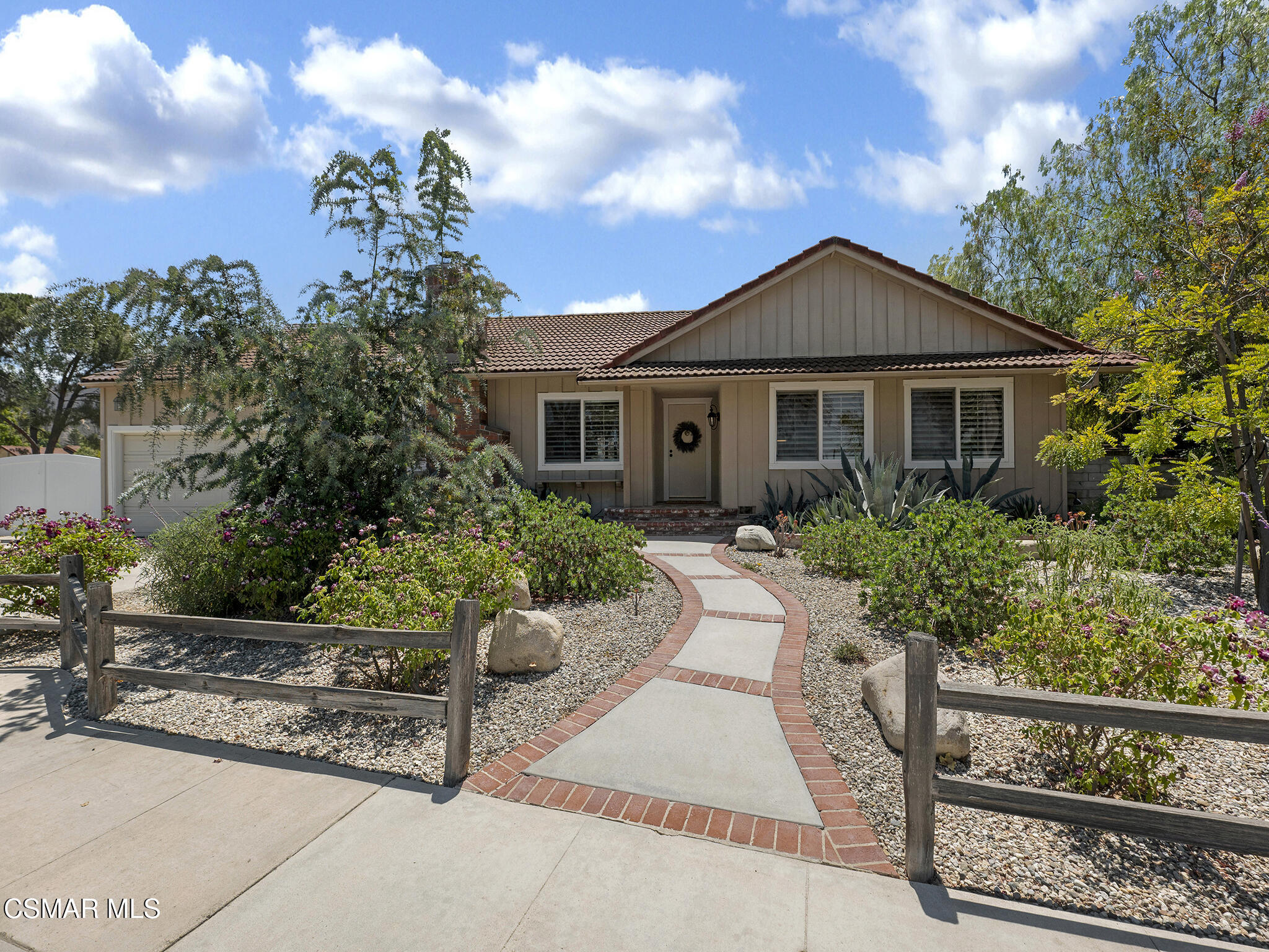 1506 Rambling Road Simi Valley, CA 93065 - Photo 70 of 79 a front view of a house with garden