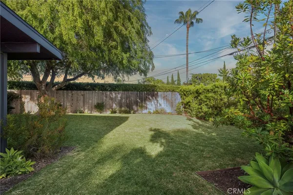 a view of a back yard of the house