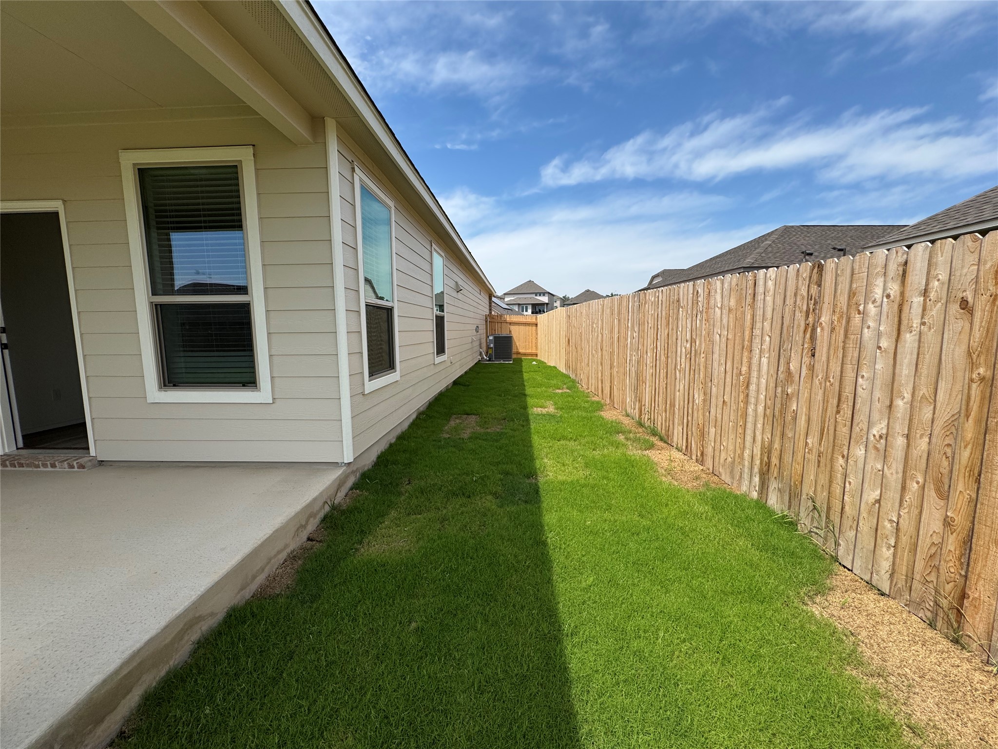 216 Coastal Way Georgetown, TX 78628 - Photo 27 of 38 a view of a backyard with garden