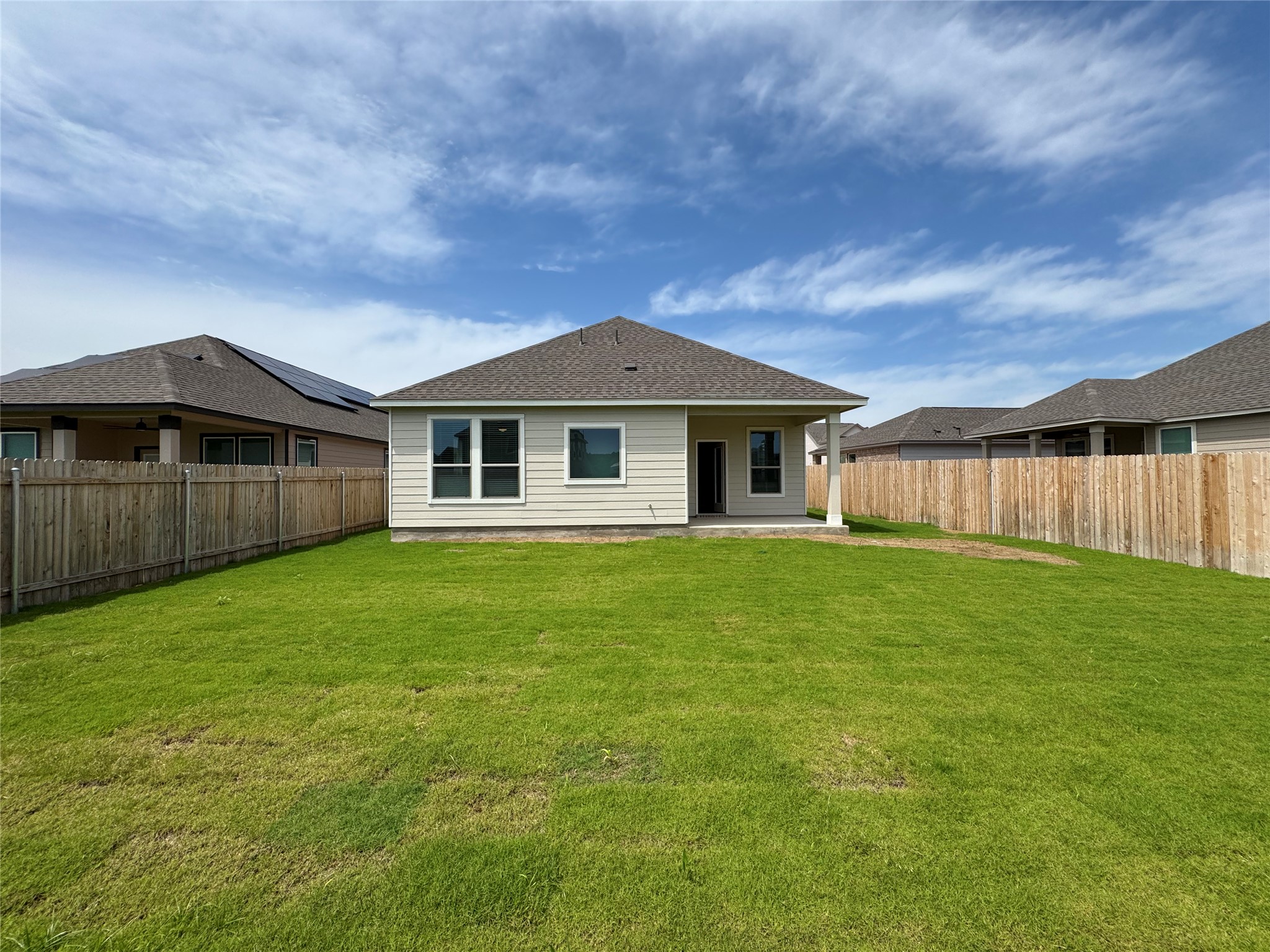 216 Coastal Way Georgetown, TX 78628 - Photo 28 of 38 a front view of a house with a garden