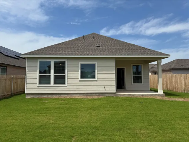 a view of a backyard with garden