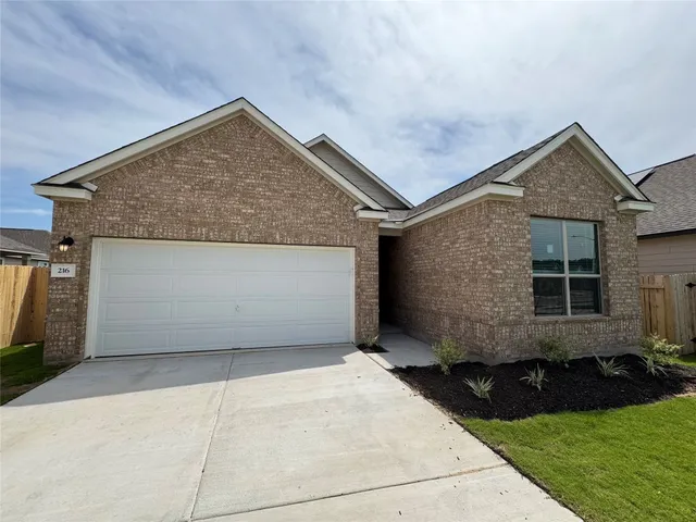 a view of a back yard of the house