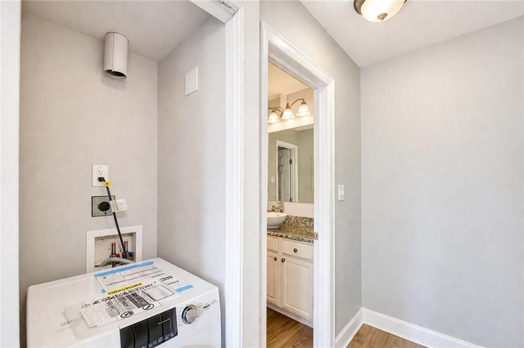 6980 Roswell Road, Unit C5 Atlanta, GA 30328 - Photo 12 of 22 a view of kitchen and utility room