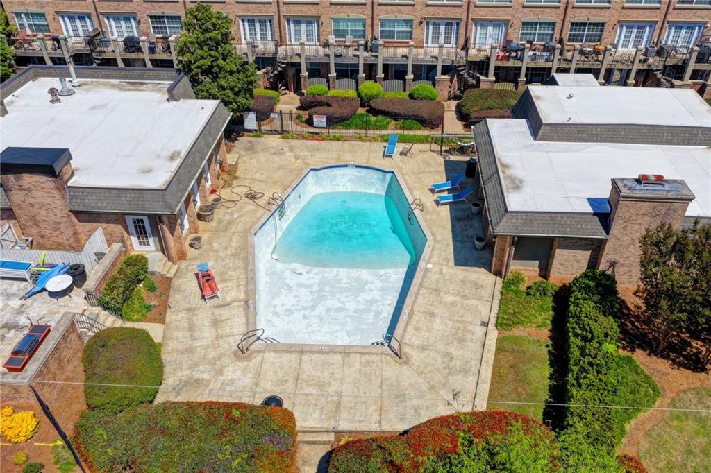 6980 Roswell Road, Unit C5 Atlanta, GA 30328 - Photo 20 of 22 an aerial view of a house with swimming pool and patio
