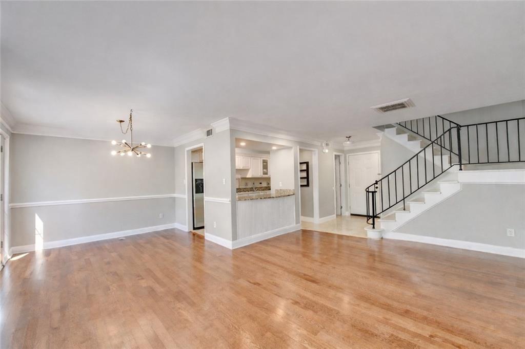 6980 Roswell Road, Unit C5 Atlanta, GA 30328 - Photo 4 of 22 a view of an empty room with a window