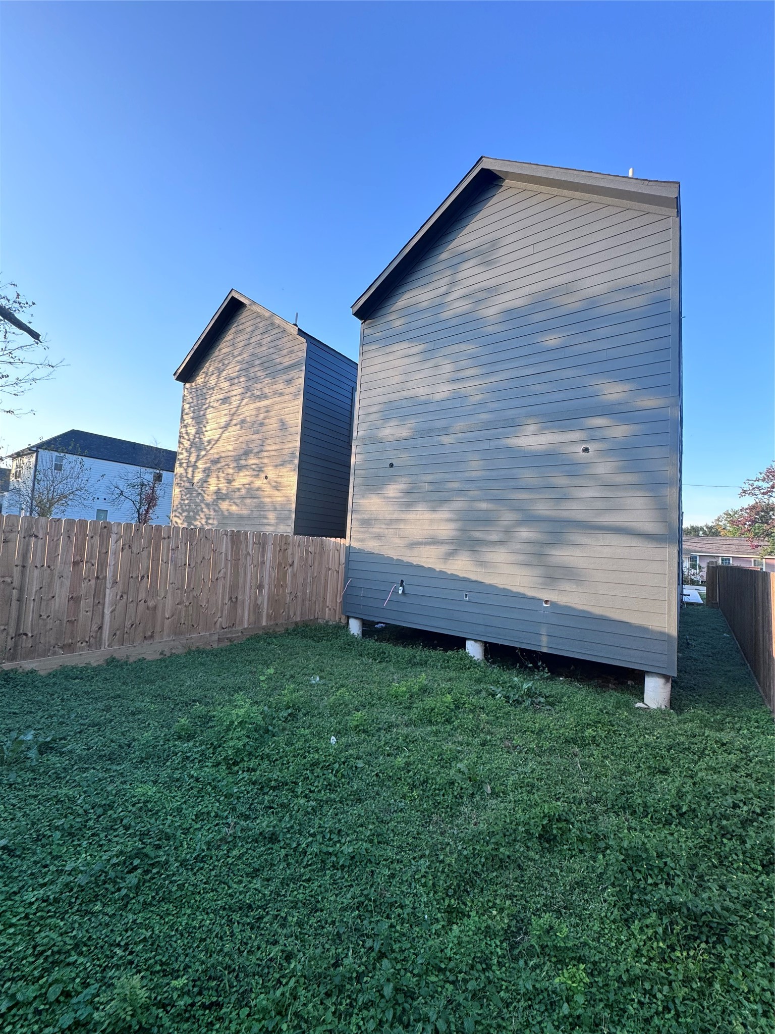 230 East 38th Street Houston, TX 77018 - Photo 7 of 7 a view of a backyard with wooden fence