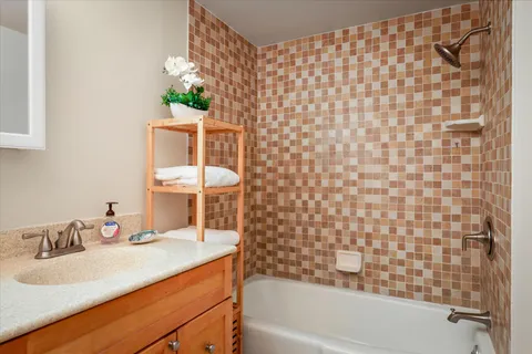 a bathroom with a sink and a bathtub