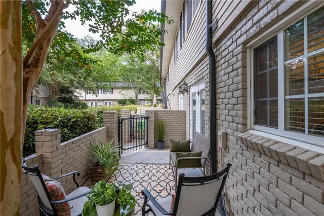 a view of balcony with furniture