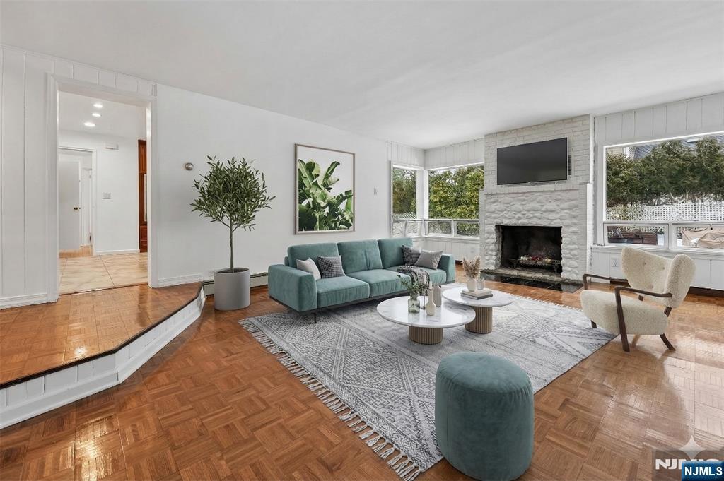52 Knickerbocker Road Demarest, NJ 07627 - Photo 4 of 11 a living room with furniture and a fireplace