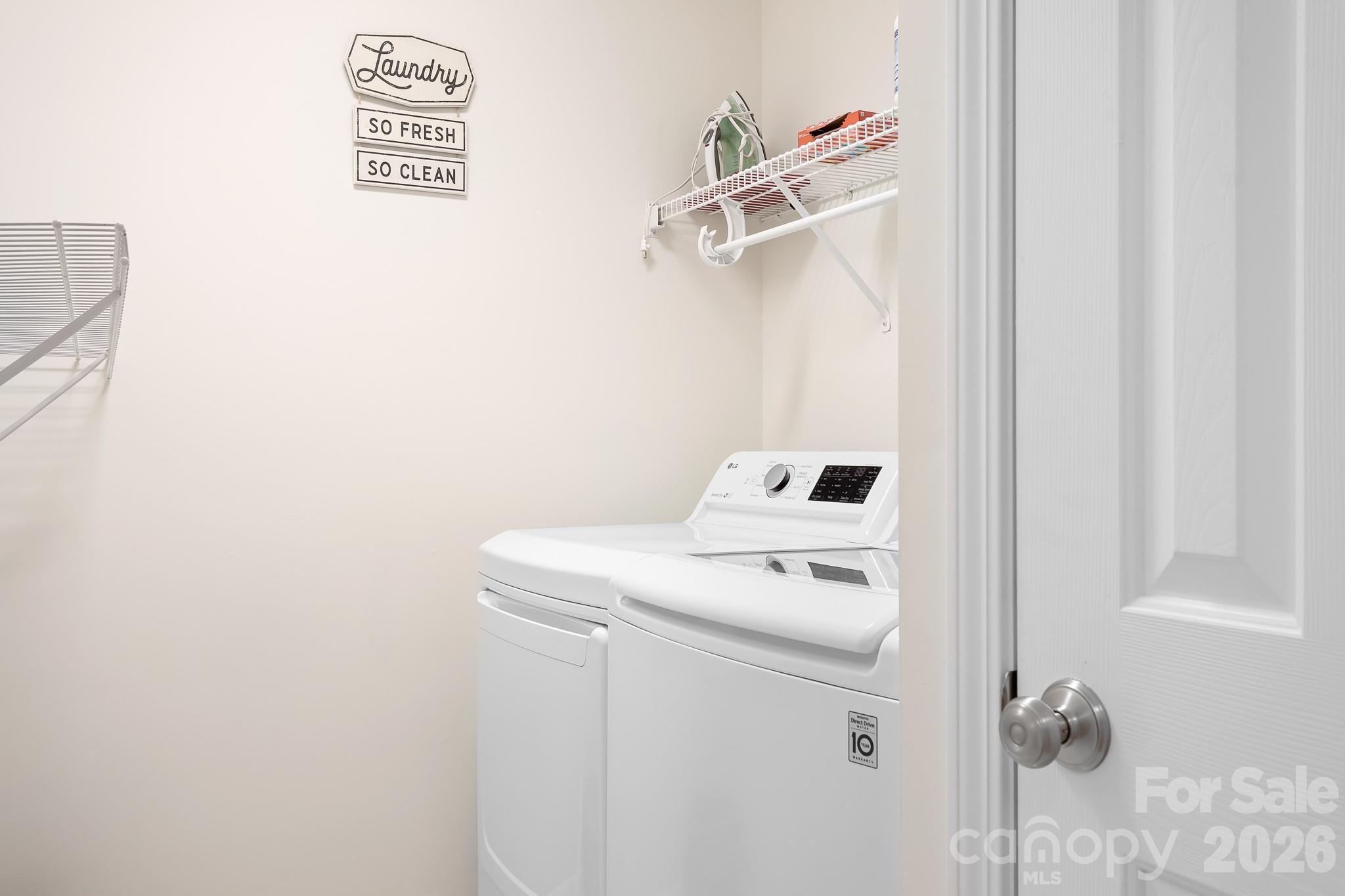 220 Chandeleur Drive Mooresville, NC 28117 - Photo 25 of 38 a utility room with dryer and washer