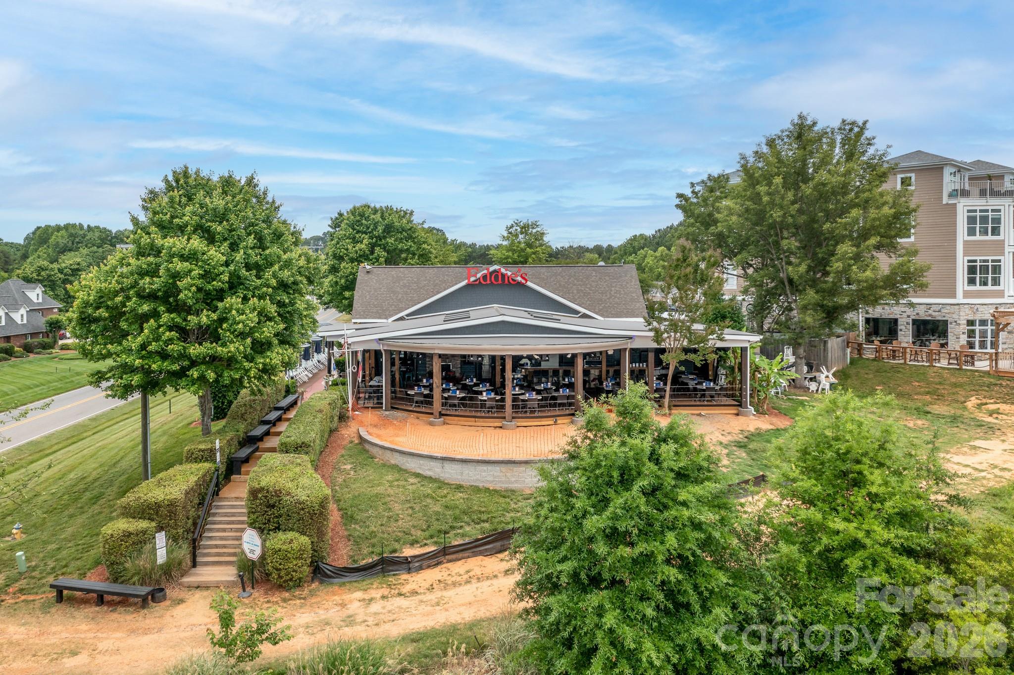 220 Chandeleur Drive Mooresville, NC 28117 - Photo 37 of 38 an aerial view of a house with a yard table and chairs