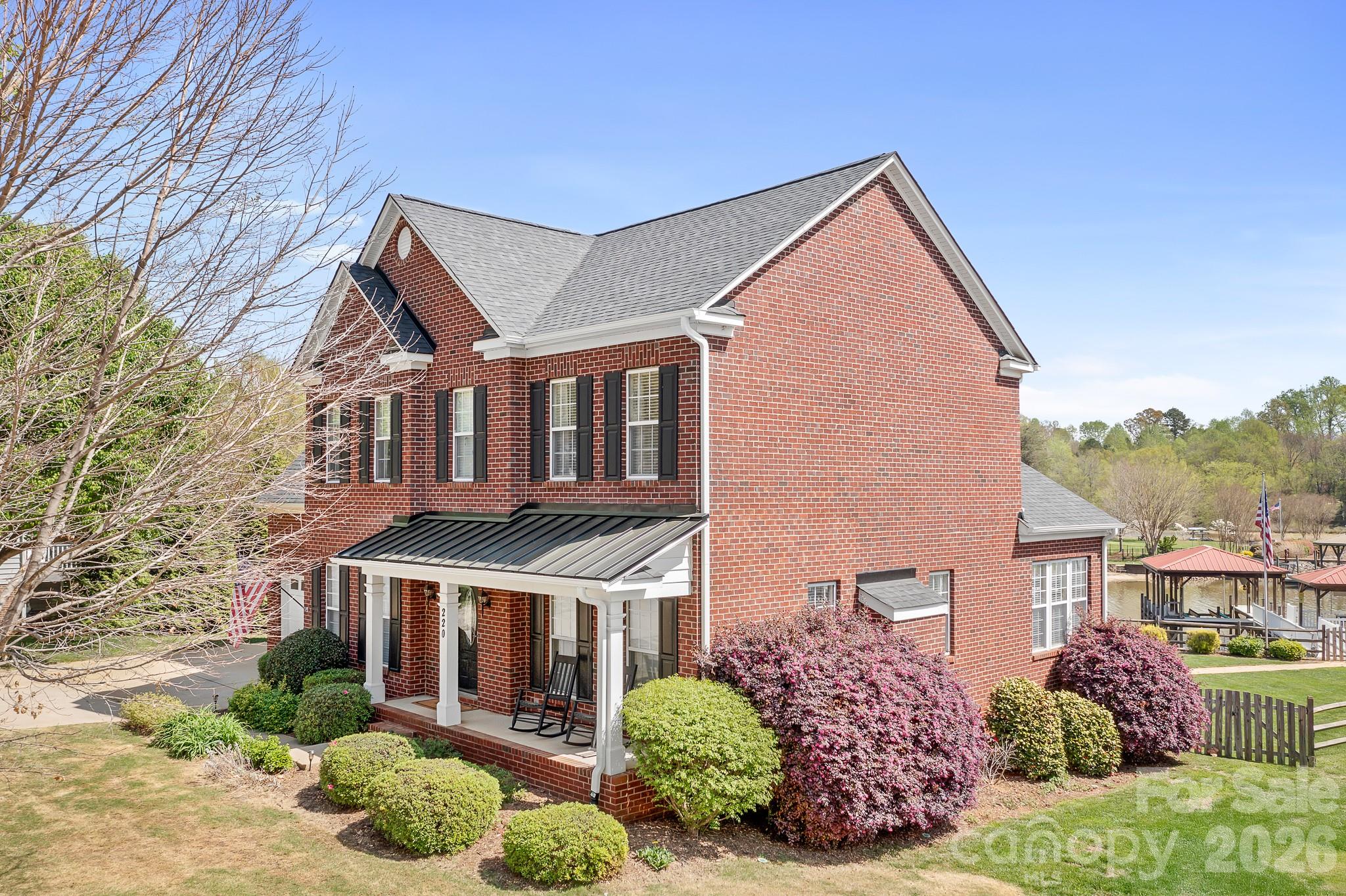 220 Chandeleur Drive Mooresville, NC 28117 - Photo 6 of 38 front view of a house with a small yard