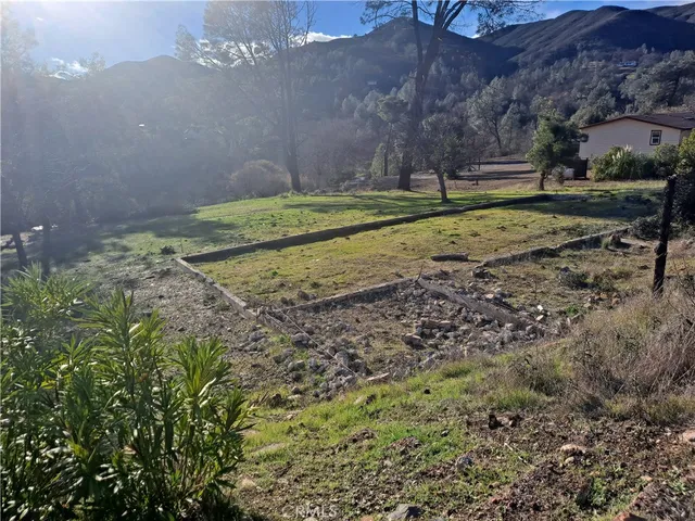 a view of swimming pool with a yard