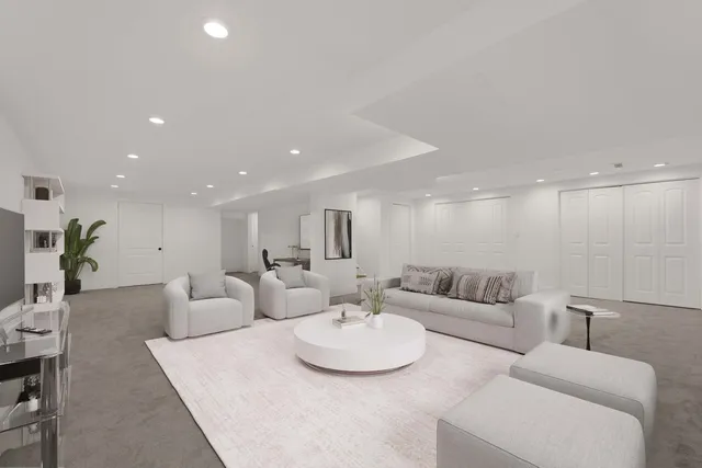 a living room with furniture and a table