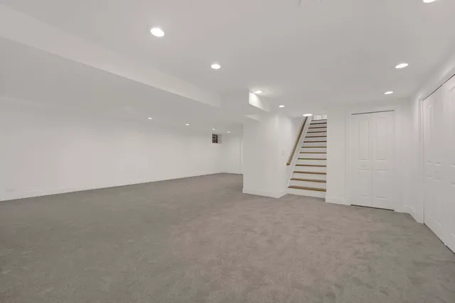 an empty room with stairs and stairs