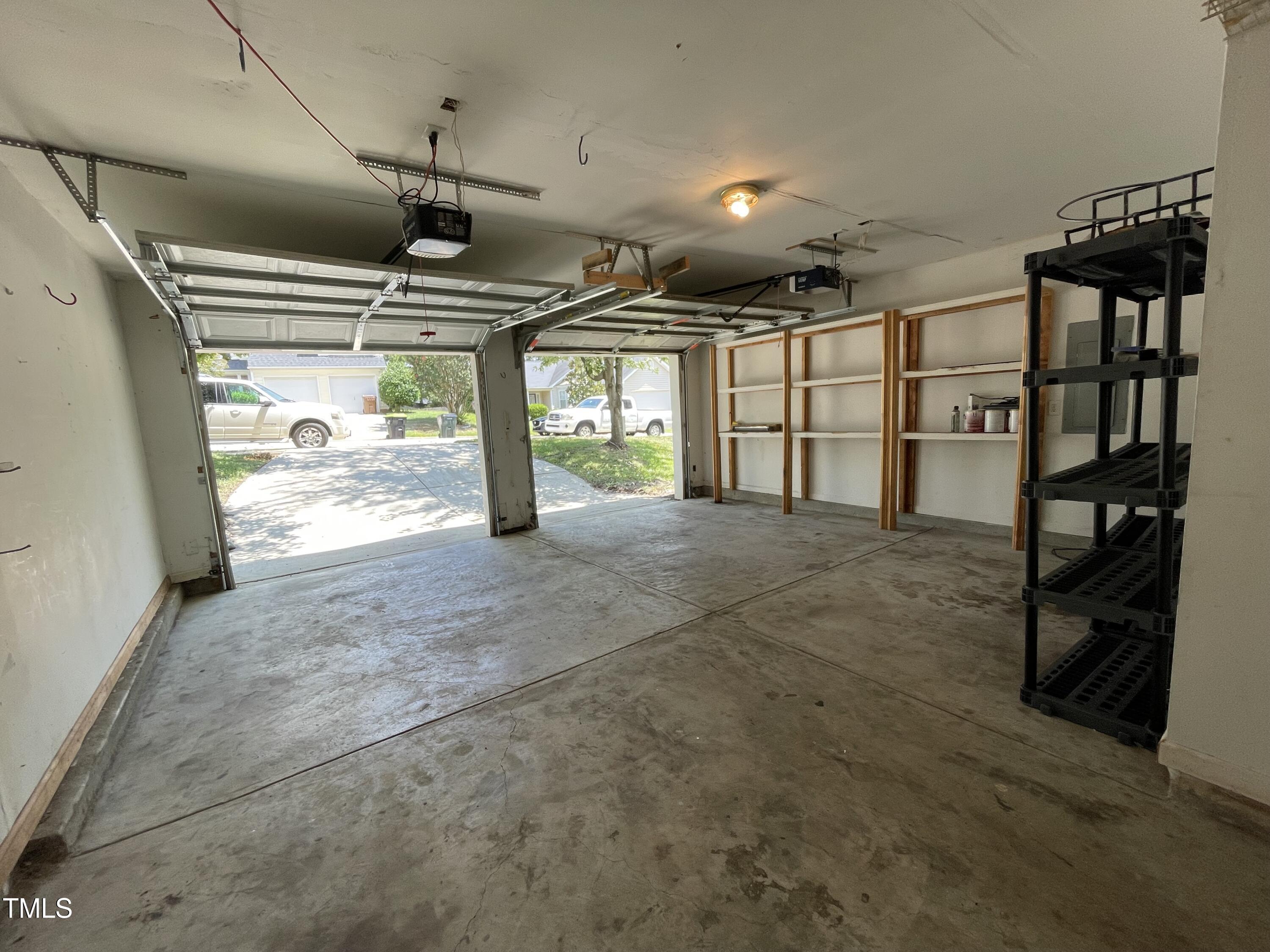 300 Firefly Road Holly Springs, NC 27540 - Photo 22 of 23 a view of a garage