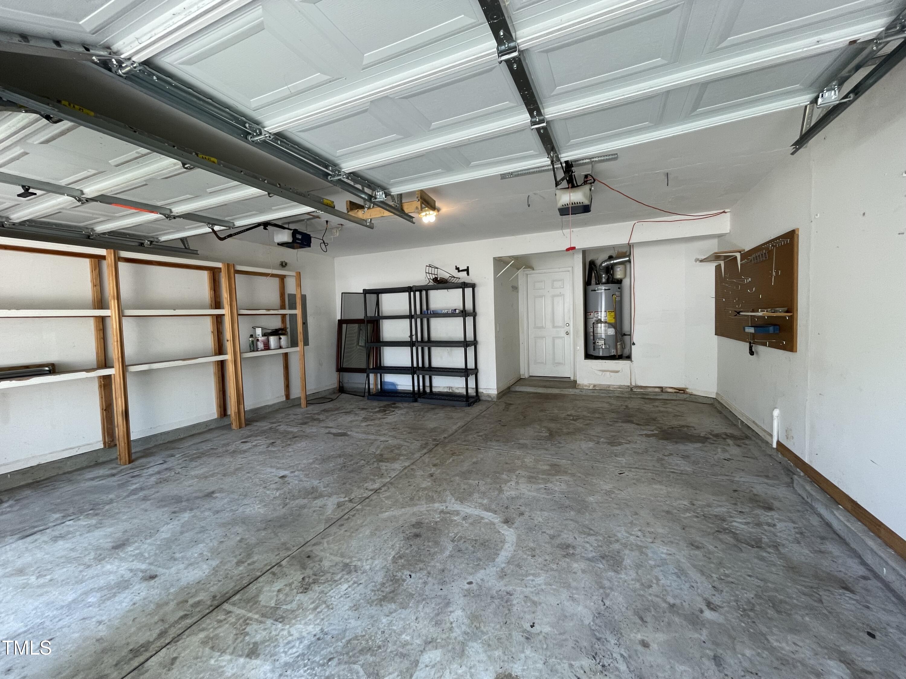 300 Firefly Road Holly Springs, NC 27540 - Photo 23 of 23 a view of a livingroom with an empty space