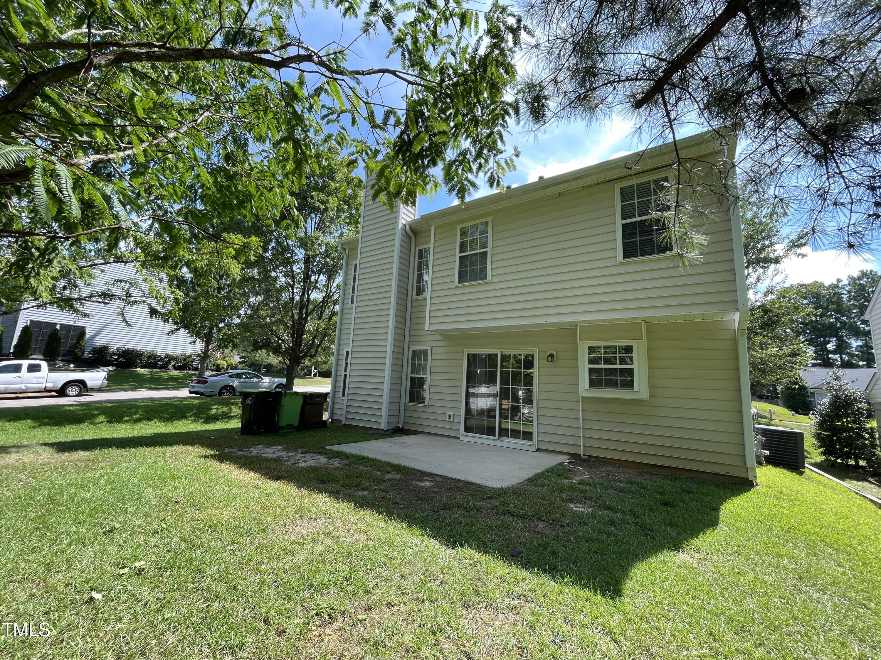 300 Firefly Road Holly Springs, NC 27540 - Photo 5 of 23 a view of a house with a yard