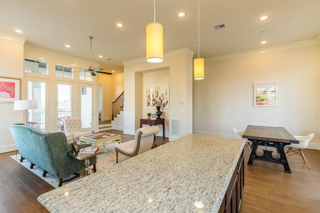 9546 London Bridge Station Houston, TX 77045 - Photo 41 of 41 This timeless open floor plan seamlessly blends everyday living with entertaining, offering ample space for friends and family to gather and enjoy your culinary creations.