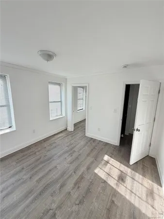 a view of livingroom with hardwood floor and window