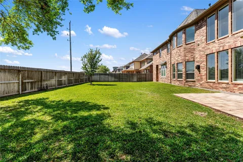 a view of a house with a big yard