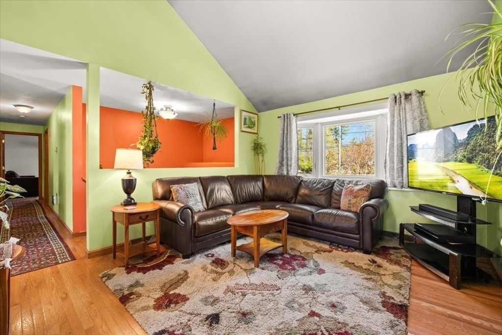 500 Wareham Street Middleboro, MA 02346 - Photo 20 of 42 a living room with furniture and a flat screen tv
