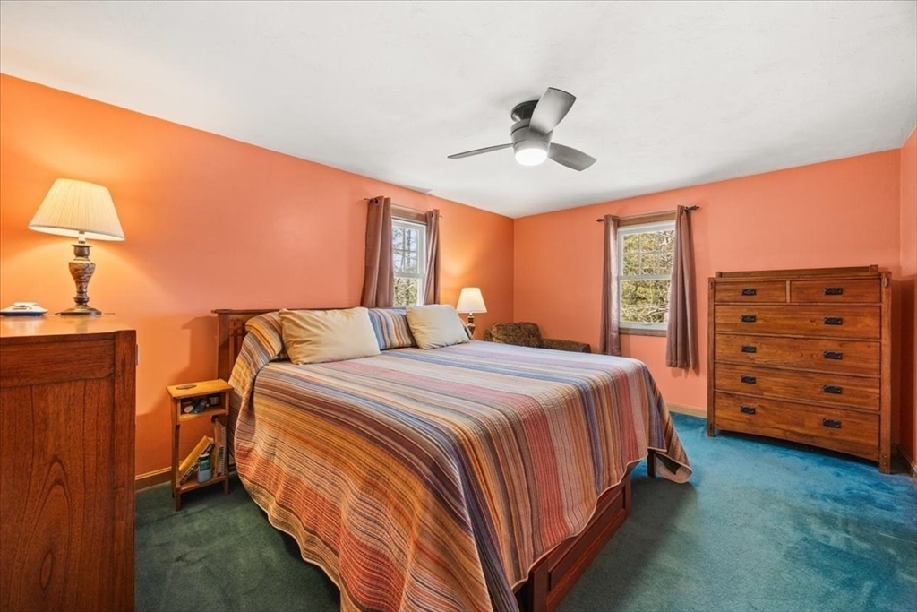 500 Wareham Street Middleboro, MA 02346 - Photo 28 of 42 a bedroom with a bed and a dresser