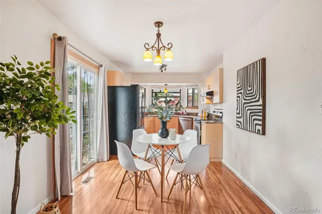 a bedroom with a bed and a mirror