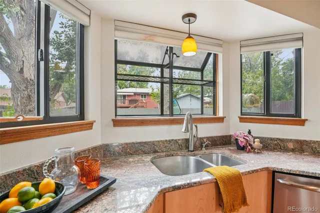 a bathroom with a sink a toilet and bathtub