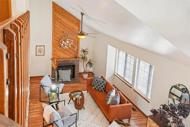 a kitchen with a stove and a wooden floors