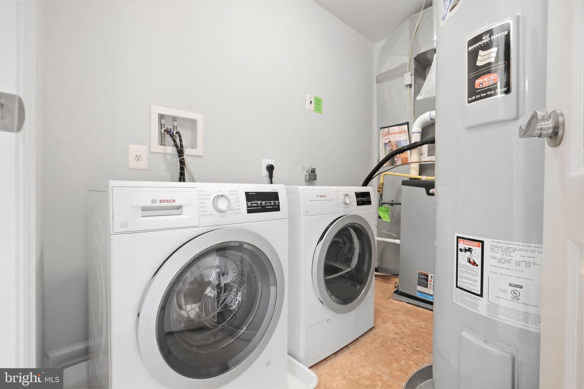 2212 Highfly Terrace, Unit 2212 Silver Spring, MD 20902 - Photo 17 of 41 Upper level laundry room