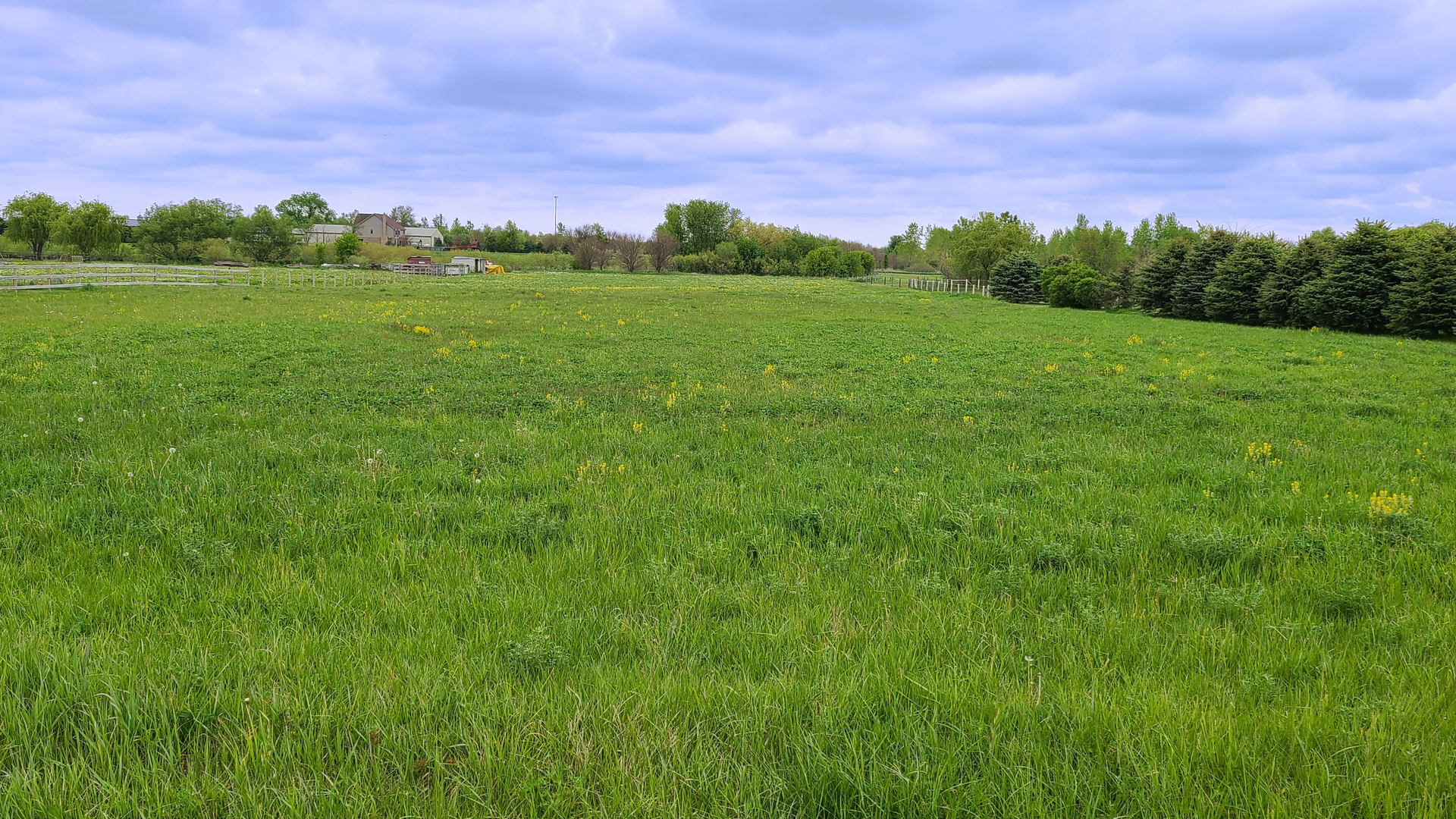 9468 West Pauling Road Monee, IL 60449 - Photo 2 of 9 a view of a lush green outdoor space with a lake view