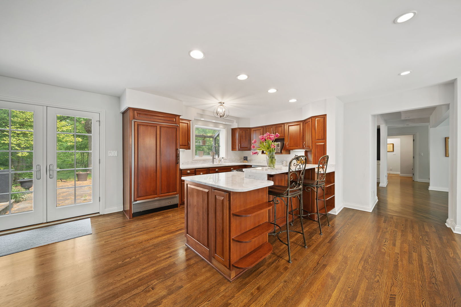 7-n751 Sayer Road Bartlett, IL 60103 - Photo 12 of 30 a kitchen with stainless steel appliances granite countertop a stove and a refrigerator